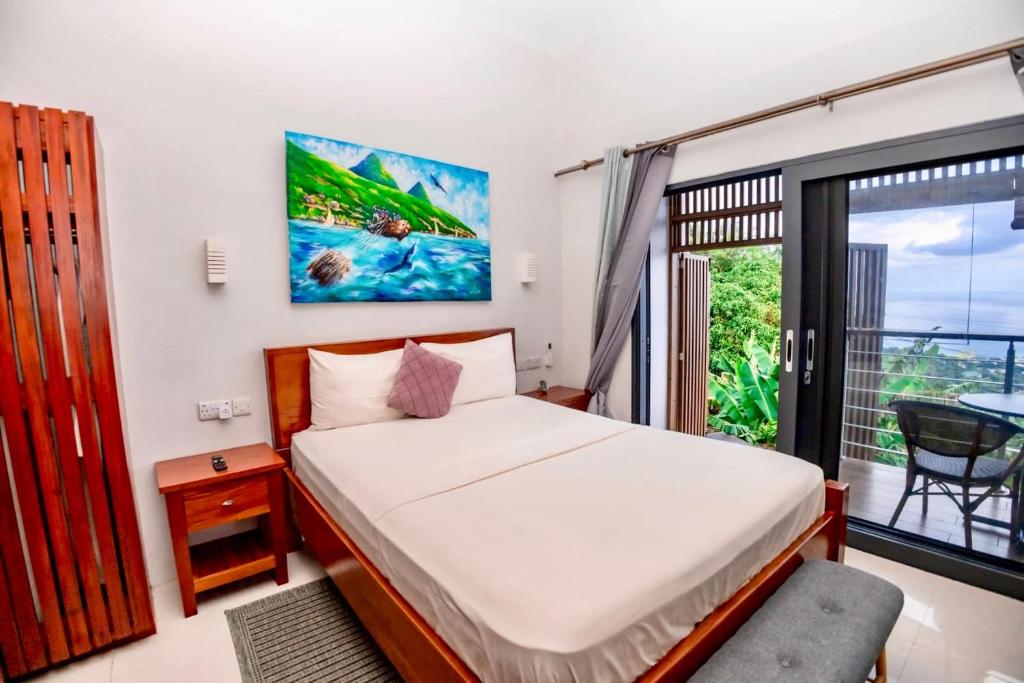 Ένα ή περισσότερα κρεβάτια σε δωμάτιο στο ZenBreak Hammock Suite Shack-Shack