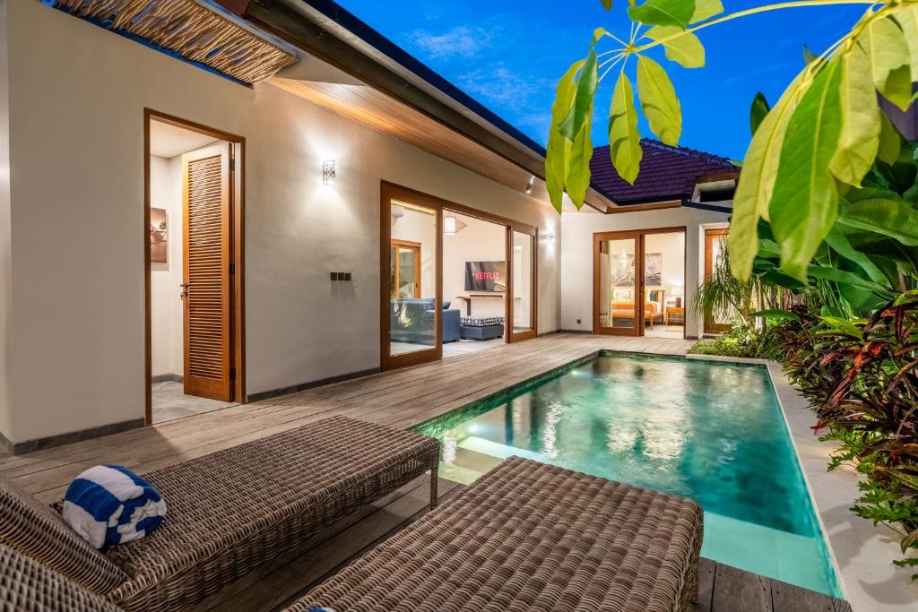 an image of a swimming pool in a villa at Villa Domus A1 in Sanur