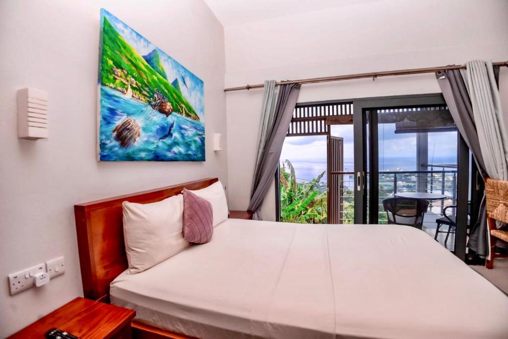 Postel nebo postele na pokoji v ubytování Hammock Suite PatPat by ZenBreak