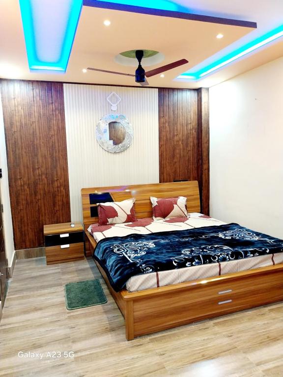 Ένα ή περισσότερα κρεβάτια σε δωμάτιο στο NEIL & NIAL Home Stay