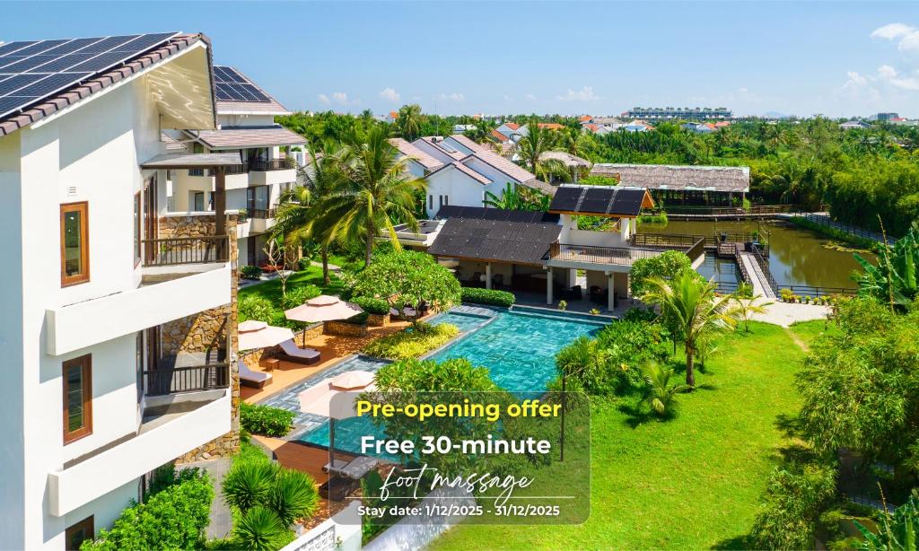 an aerial view of a resort with a swimming pool at Hoi An Eco Retreat in Hoi An