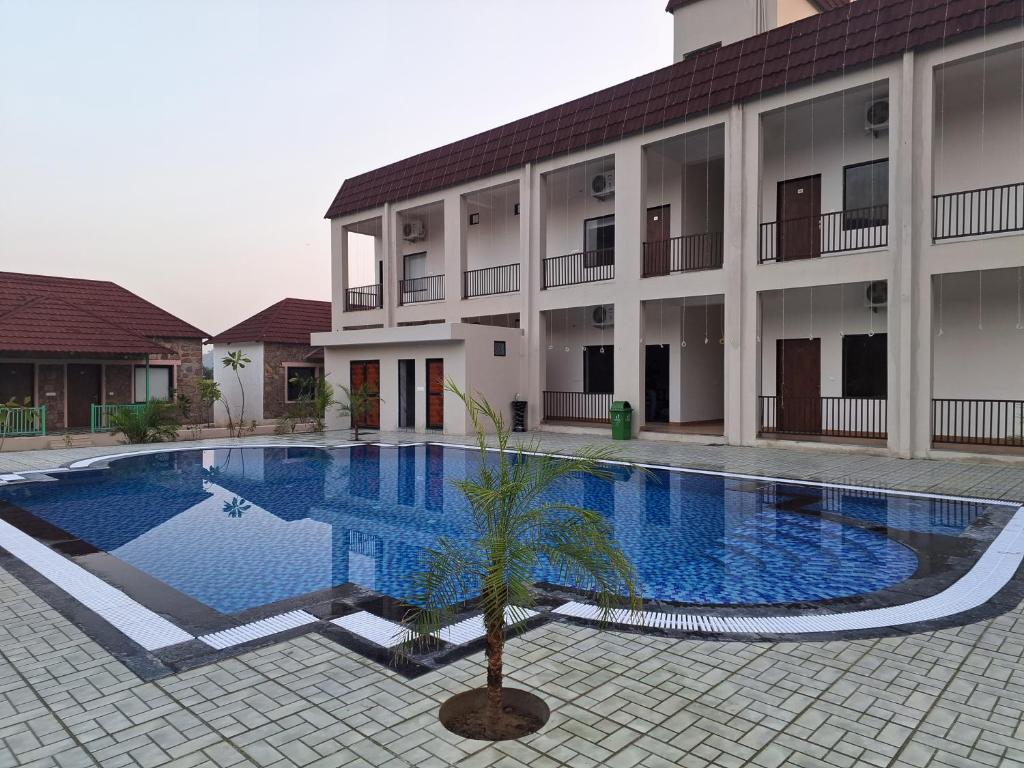 Bazén v ubytování Orchard Hills Resorts nebo v jeho okolí