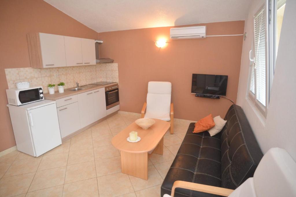Kuchyňa alebo kuchynka v ubytovaní Apartments Salamun