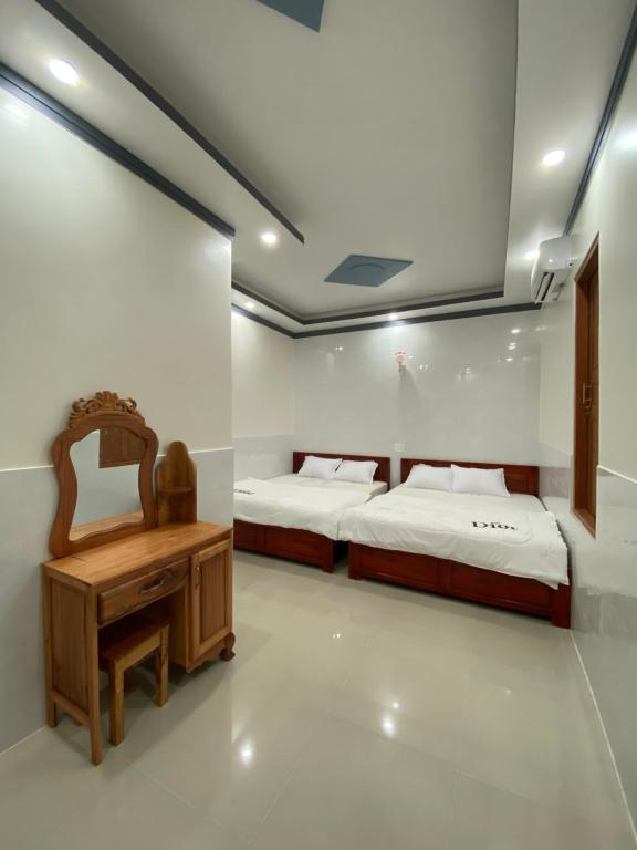 Tùng Thủy Homestay - Dinh Thầy Thím Lagi - Deluxe Familienzimmer