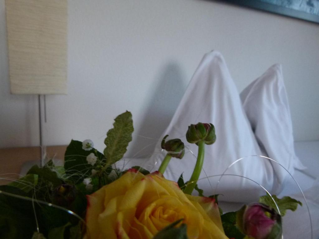 Postel nebo postele na pokoji v ubytování Hotel Fischachstubn