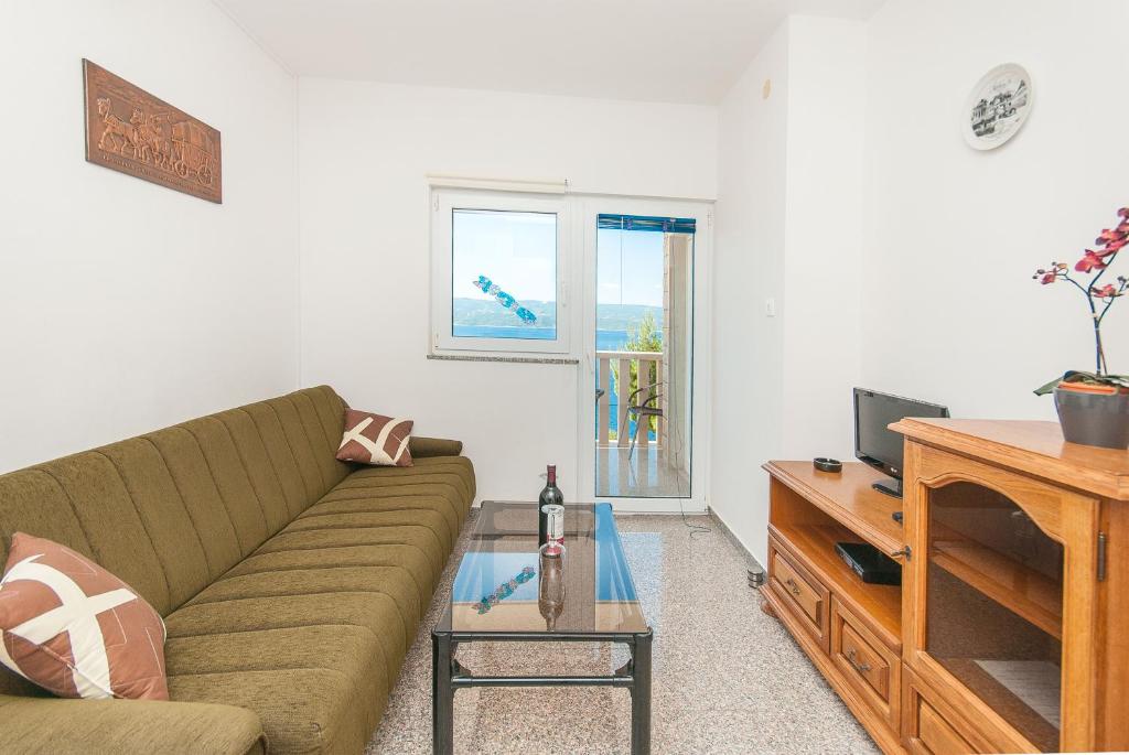 TV a/nebo společenská místnost v ubytování Apartmani Vesna