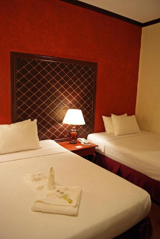 Postel nebo postele na pokoji v ubytování Hotel San Marco