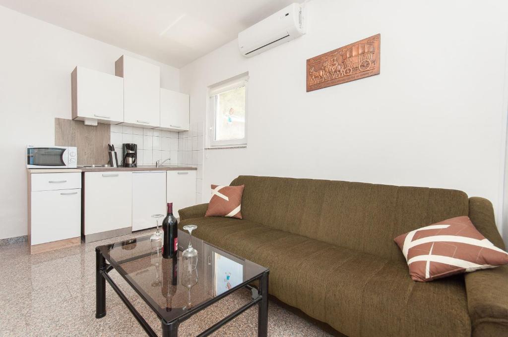 Kuchyň nebo kuchyňský kout v ubytování Apartmani Vesna