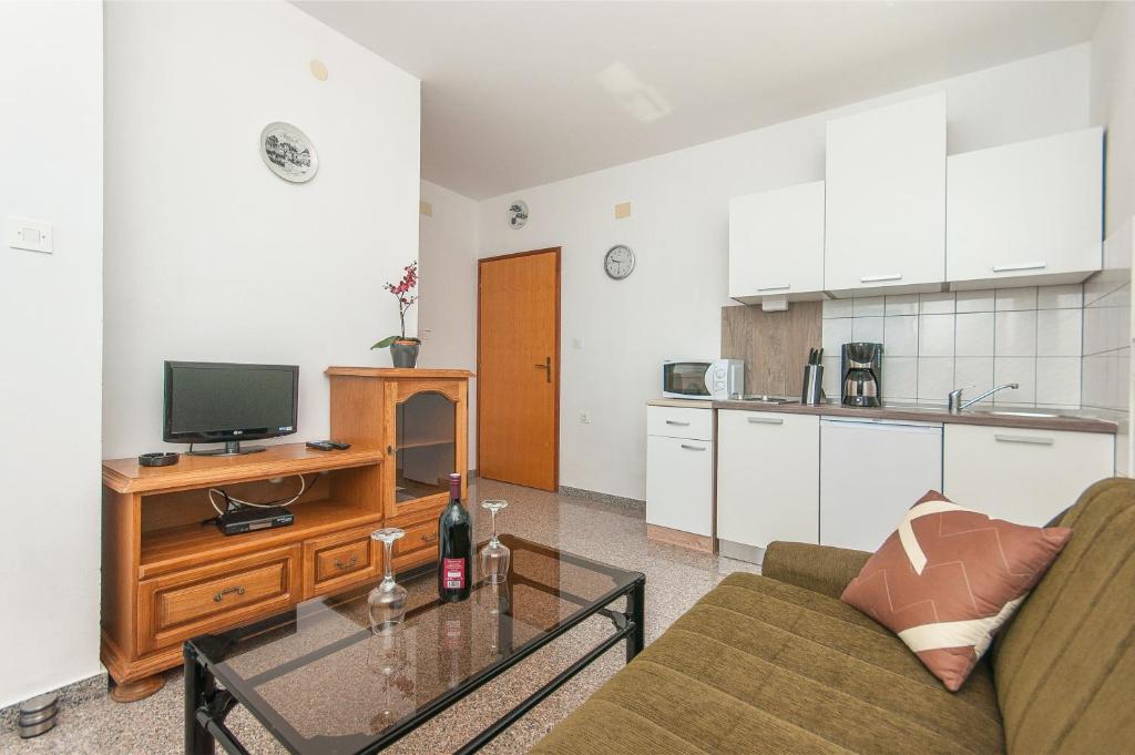 Kuchyň nebo kuchyňský kout v ubytování Apartmani Vesna