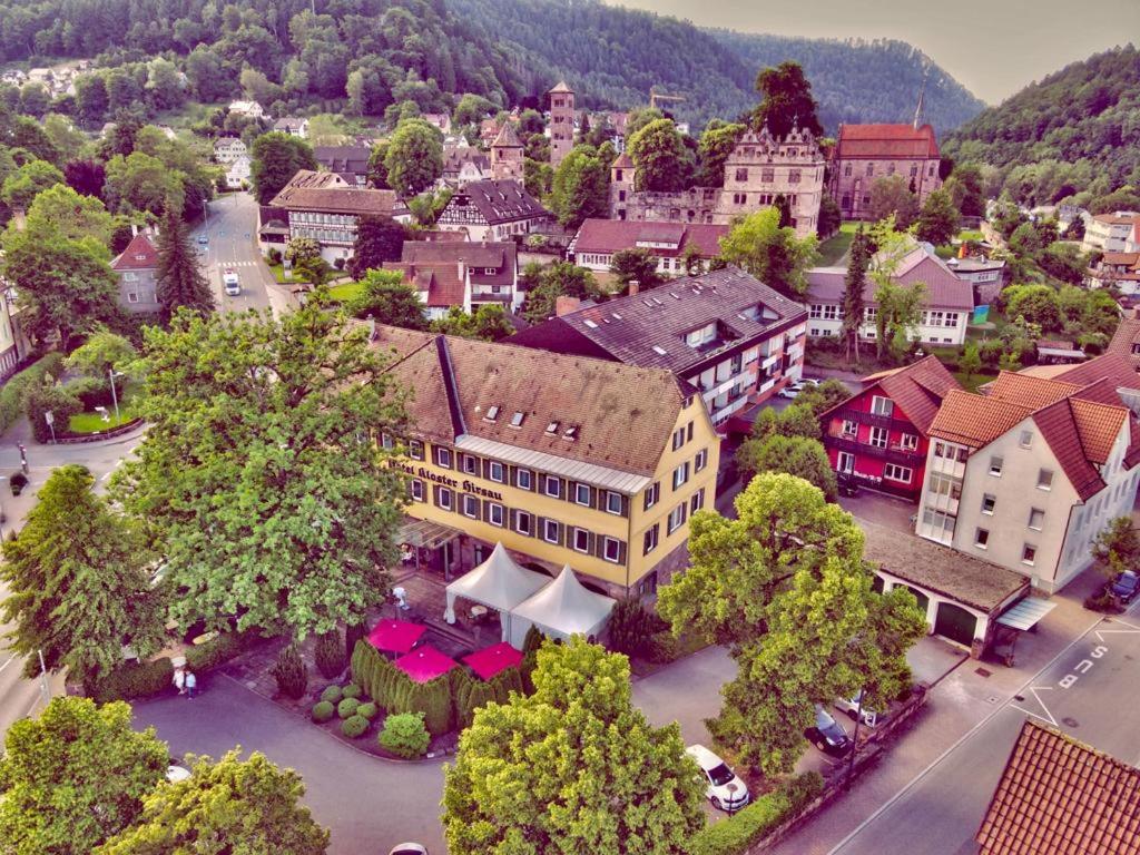 an aerial view of a town with a large building at Hotel Kloster Hirsau in Calw