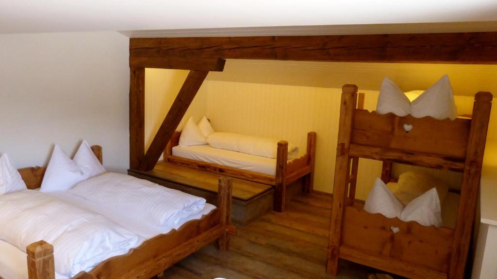 Postel nebo postele na pokoji v ubytování Berglodge Ristis