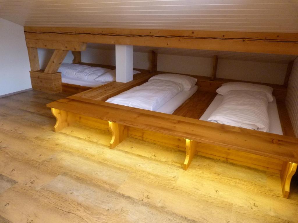 Postel nebo postele na pokoji v ubytování Berglodge Ristis