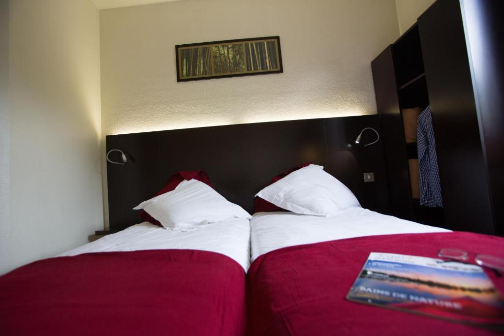 Postel nebo postele na pokoji v ubytování Hôtel Akena Creil - Clermont Agnetz