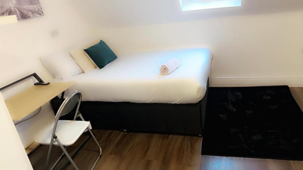 Ένα ή περισσότερα κρεβάτια σε δωμάτιο στο Cosy Ensuite Room