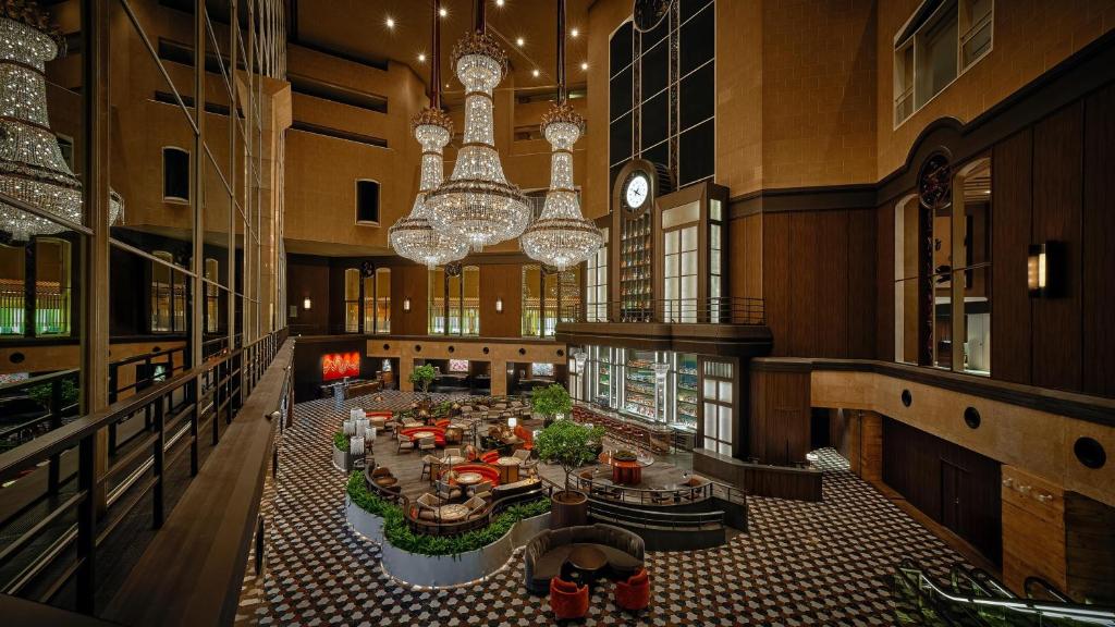 an overhead view of a hotel lobby with chandeliers at Hyatt Regency Tokyo in Tokyo