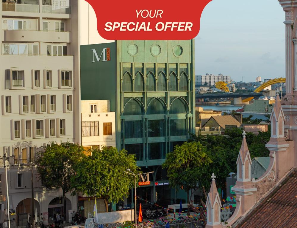 a sign that reads your special offer in front of a building at M Village Hotel Da Nang Centre - Free Laundry and Kitchen in Da Nang