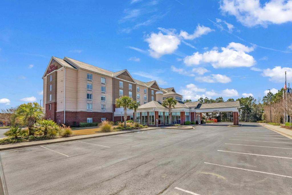 a rendering of a hotel with a parking lot at Hilton Garden Inn Myrtle Beach/Coastal Grand Mall in Myrtle Beach