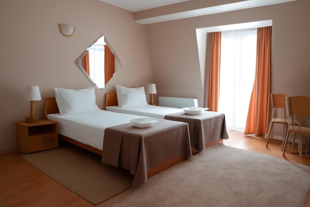 
Triple Room with 3 Single Beds
