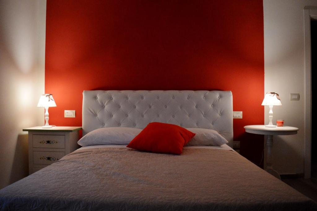 Postel nebo postele na pokoji v ubytování B&B Harmonia