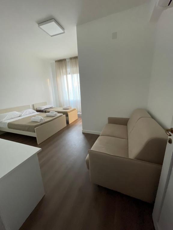 Postel nebo postele na pokoji v ubytování amoR Tempora