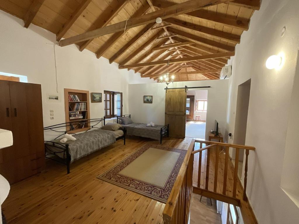 Ένα ή περισσότερα κρεβάτια σε δωμάτιο στο VΛ Village house 'Liodentro'