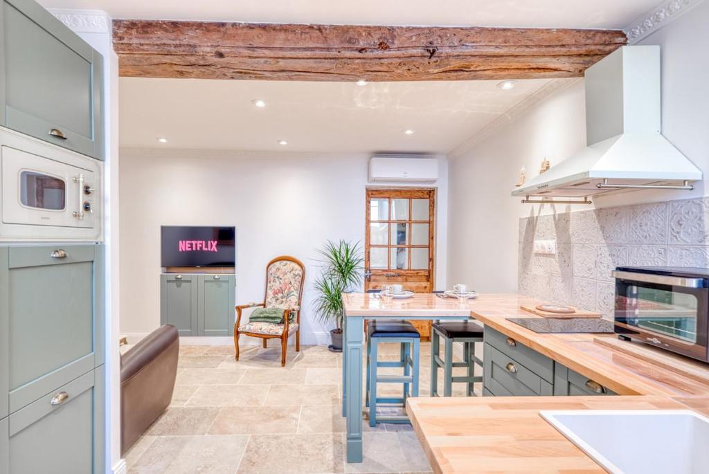 Η κουζίνα ή μικρή κουζίνα στο Le Buckingham - CNPE - Meximieux