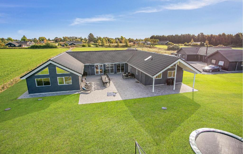 an overhead view of a house with a yard at Gorgeous Home In Stege With Sauna in Stege