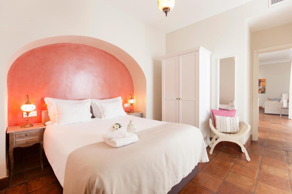 Postel nebo postele na pokoji v ubytování Apartamentos Casa del Aceite