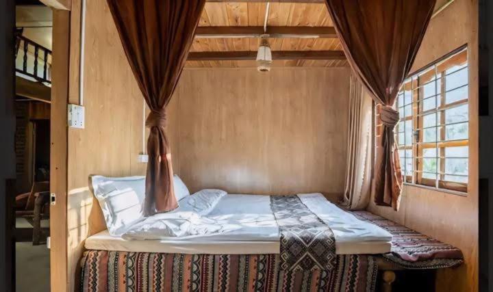 Postel nebo postele na pokoji v ubytování PaoDzung homestay Tả Van
