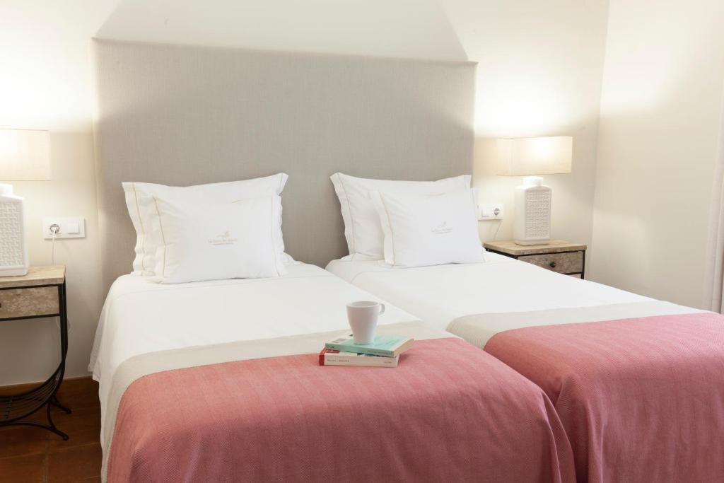 Postel nebo postele na pokoji v ubytování Apartamentos Casa del Aceite