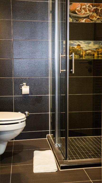 Koupelna v ubytování Hotel Kapetanovina