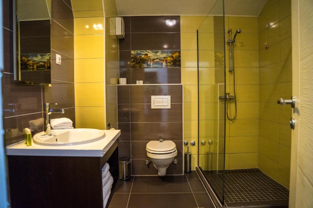Koupelna v ubytování Hotel Kapetanovina