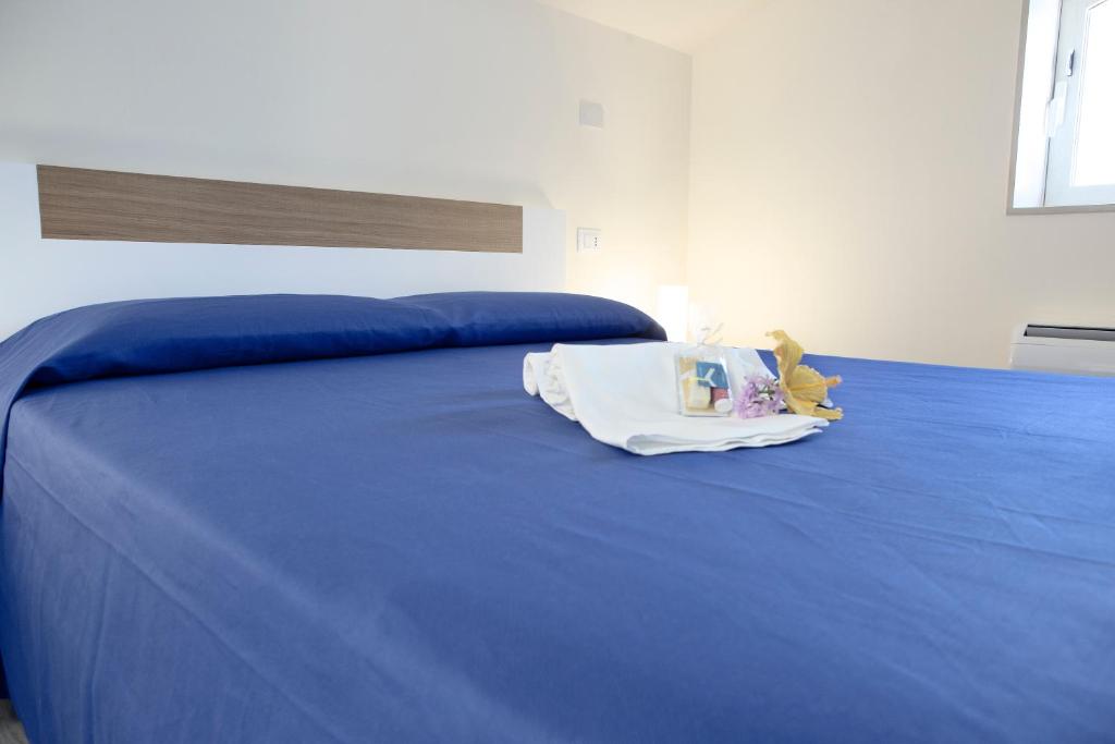 Postel nebo postele na pokoji v ubytování La Giara Guest House