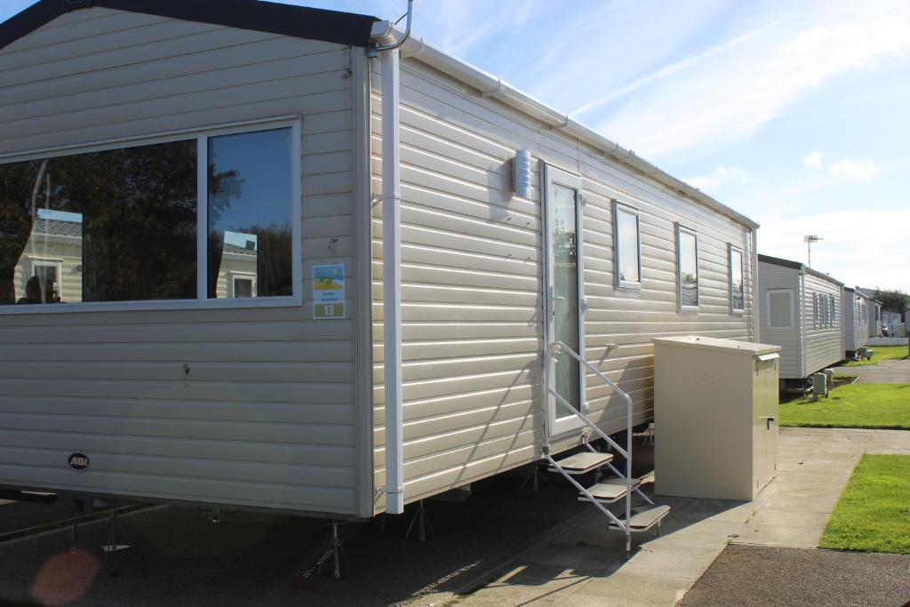 a silver trailer parked in a parking lot at Clearsands at Haven in Mablethorpe