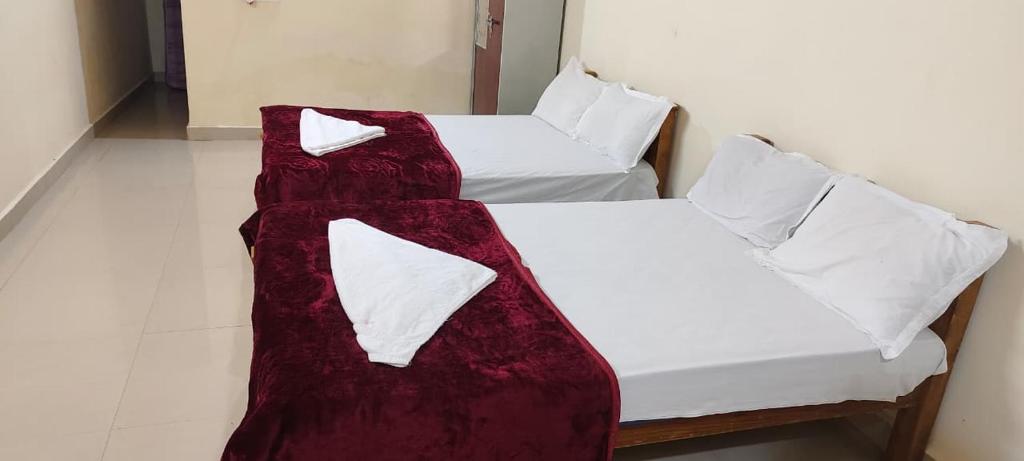 Una cama o camas en una habitación de Sierra coorg Homestay