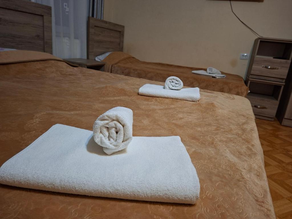 Postel nebo postele na pokoji v ubytování Family