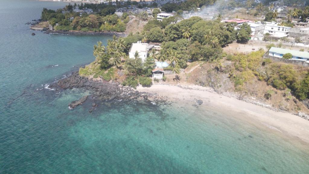 an aerial view of an island in the ocean at Hôtel Restaurant Le Papillon 