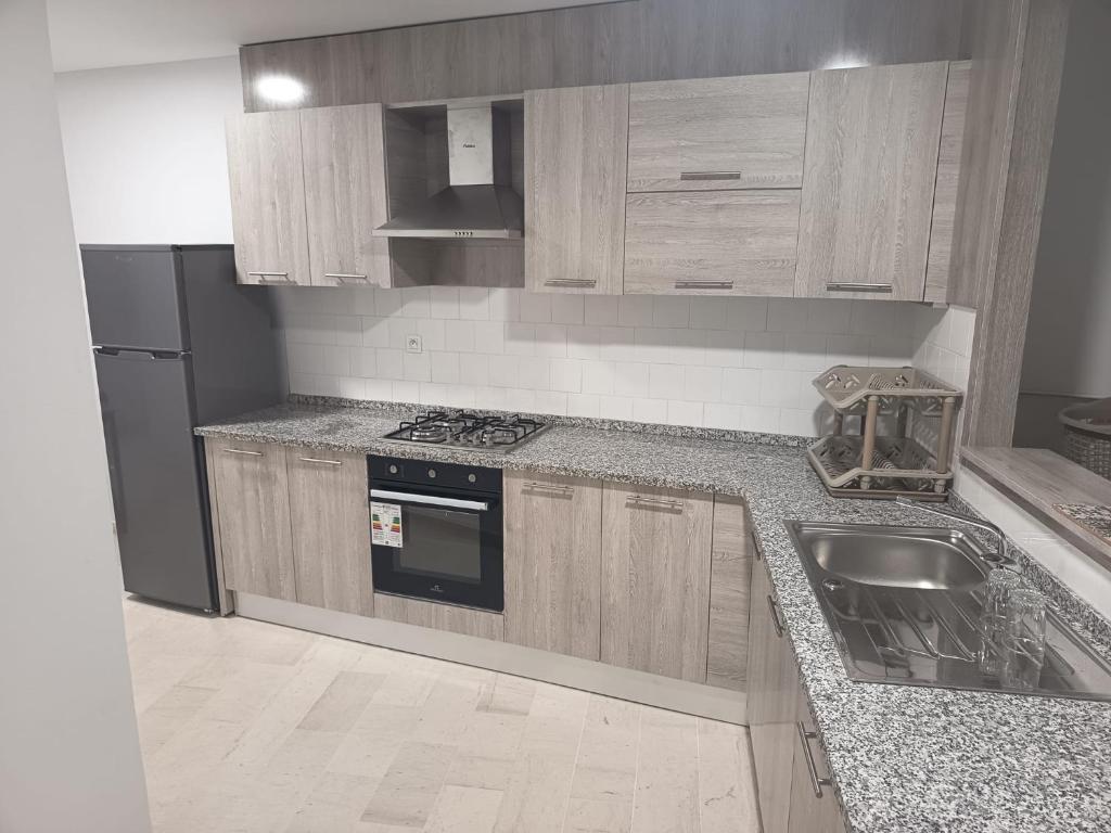 Η κουζίνα ή μικρή κουζίνα στο Appartement hyper centre avec vue exceptionnelle de Hammamet