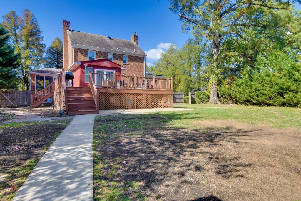 a home with a large deck and a house at Work and Explore in DC! Cheverly Apt half Mi to Metro in Cheverly