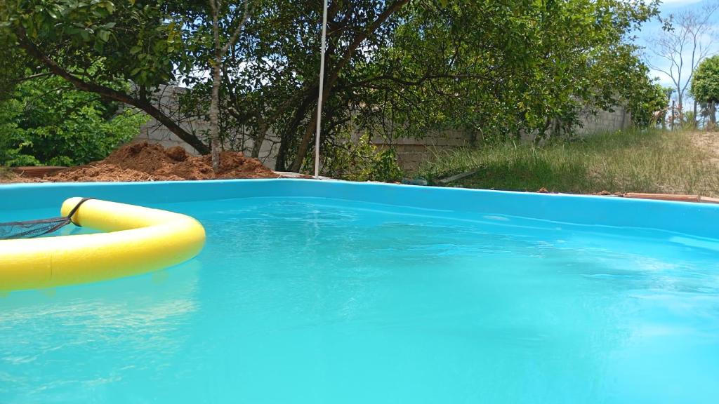 Bazén v ubytování Chácara encanto do luar nebo v jeho okolí