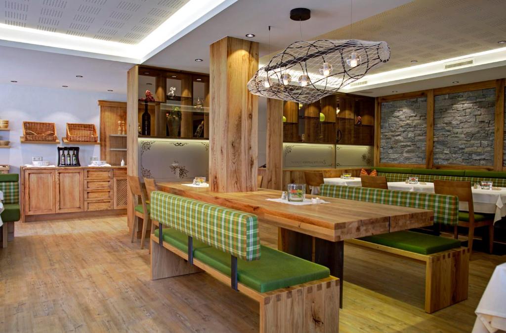 Restavracija oz. druge možnosti za prehrano v nastanitvi Hotel Garni Forelle
