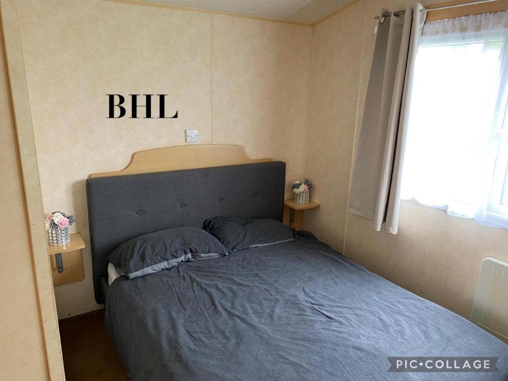 Ένα ή περισσότερα κρεβάτια σε δωμάτιο στο Blanco Holiday Lettings - Southview