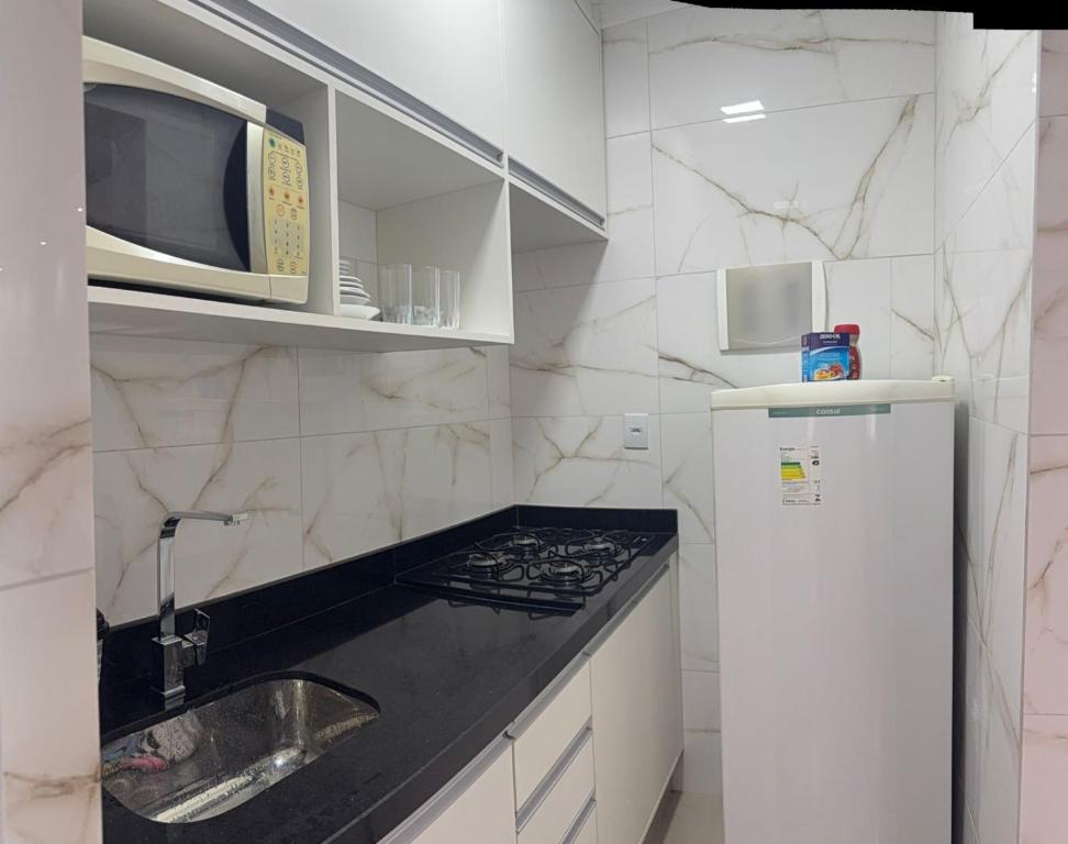 Een keuken of kitchenette bij Apê da divisa