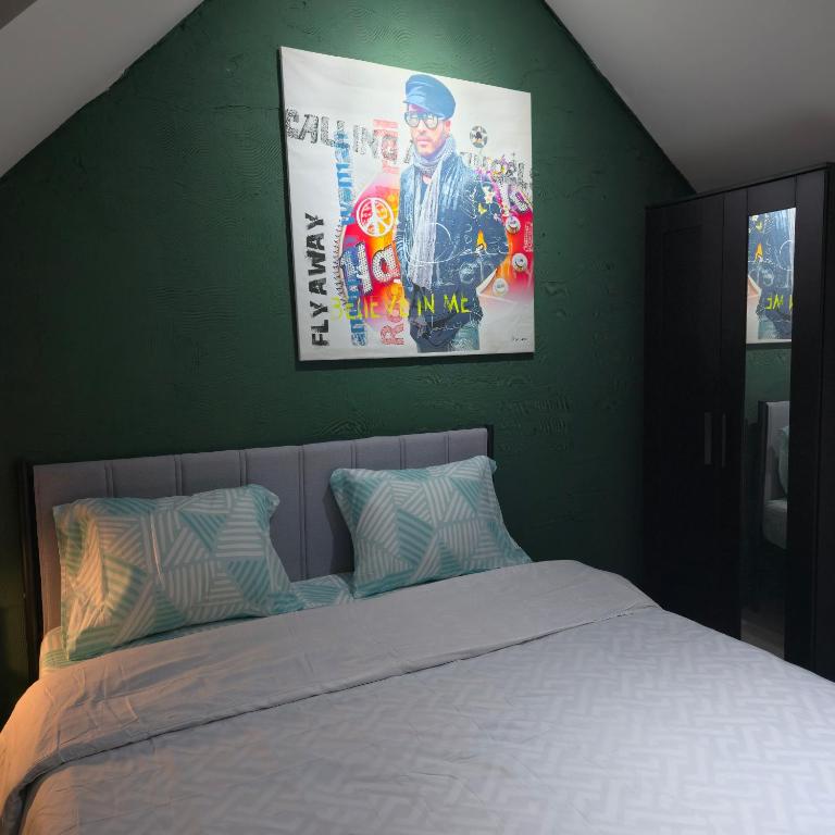 En eller flere senge i et værelse på Balacobaco