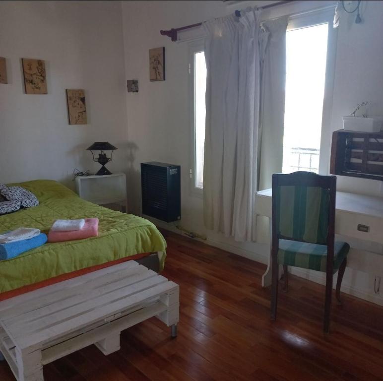 En eller flere senge i et værelse på Amplio Monoambiente semicéntrico Brizas del Sur