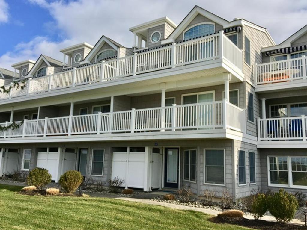 a large apartment building with a large balcony at No Chris in Waretown