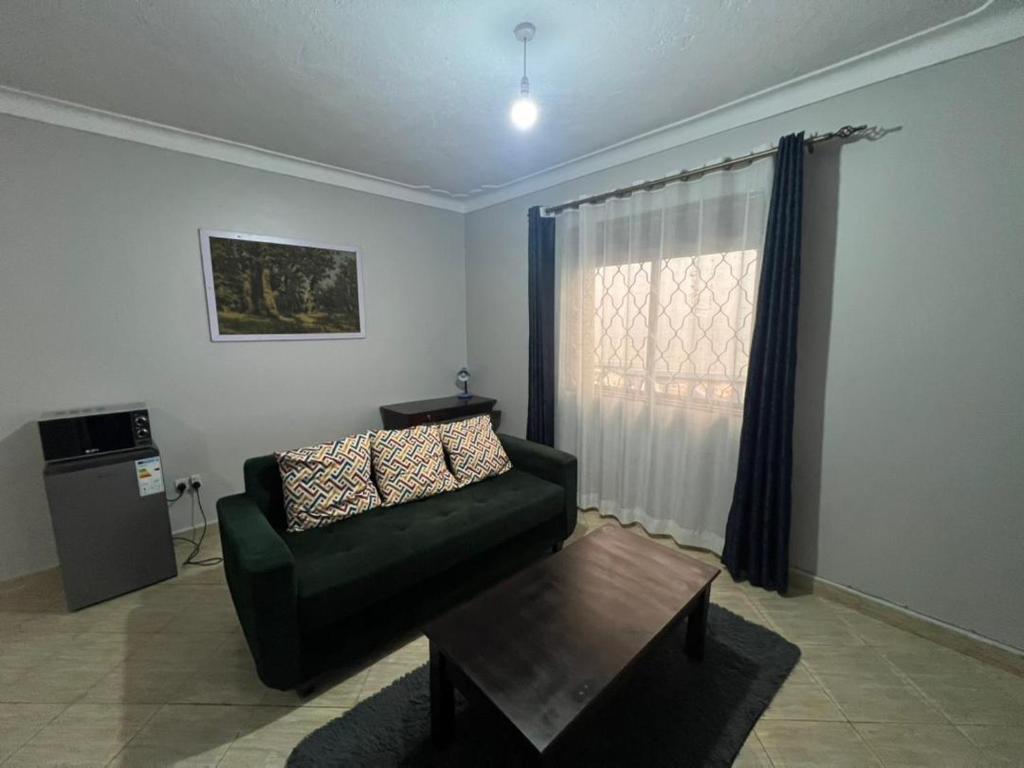 Posezení v ubytování Bukoto suites