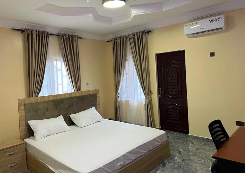 Postelja oz. postelje v sobi nastanitve De Roadmtach Hotel