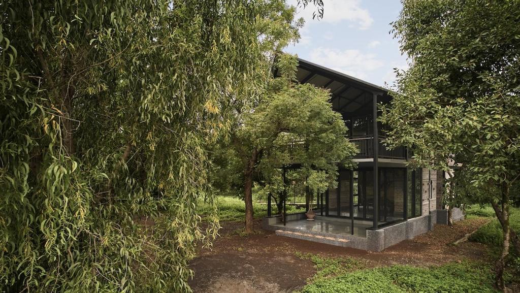 a house in the middle of some trees at ZERO9 farmPAD - Private Eco Retreat, Karjat in Karjat