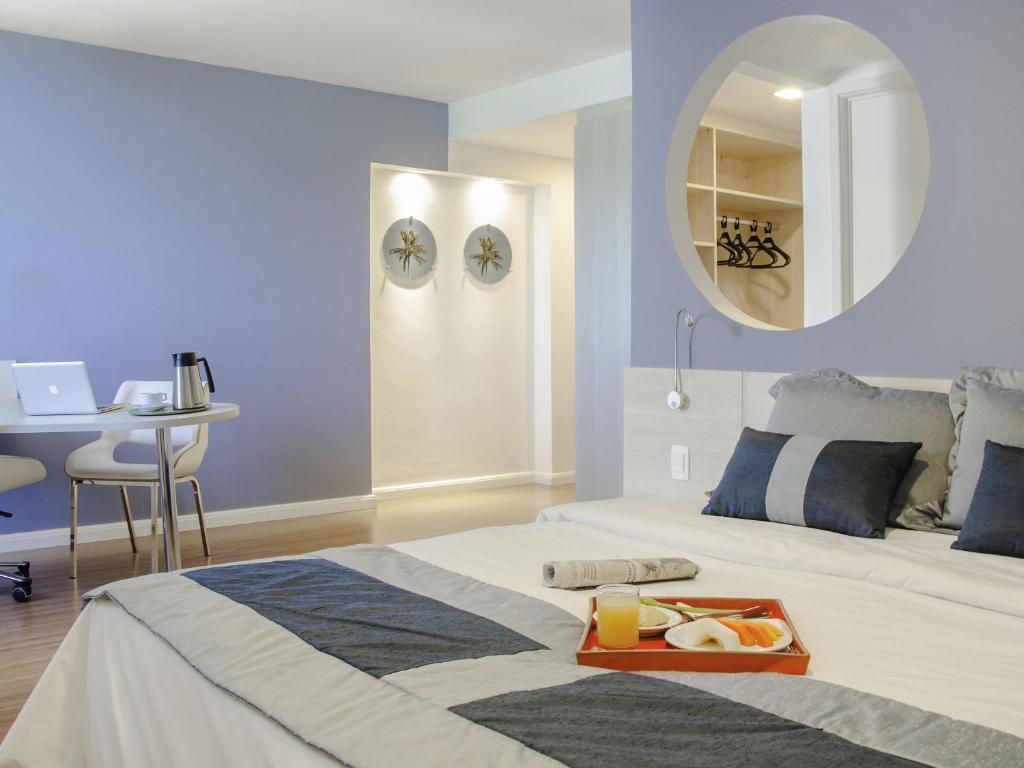 Postel nebo postele na pokoji v ubytování Mercure Recife Navegantes